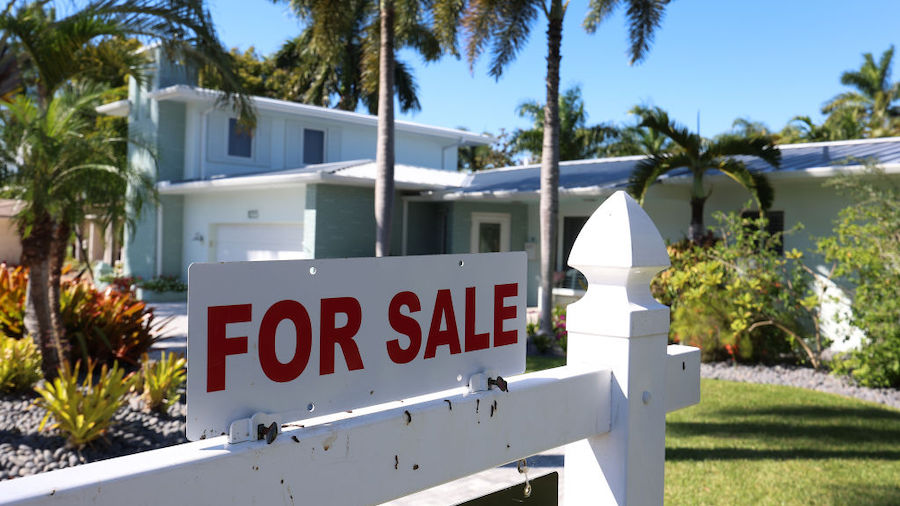 A 'For Sale' sign is posted in front of a single family home on October 27, 2022 in Hollywood, Flor...