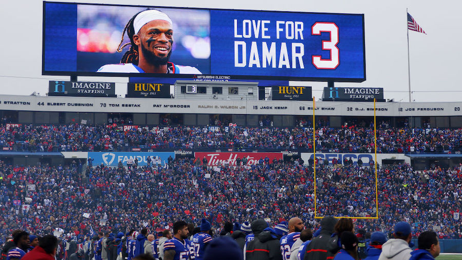 The scoreboard depicts a message of support for Damar Hamlin during the game between the New Englan...
