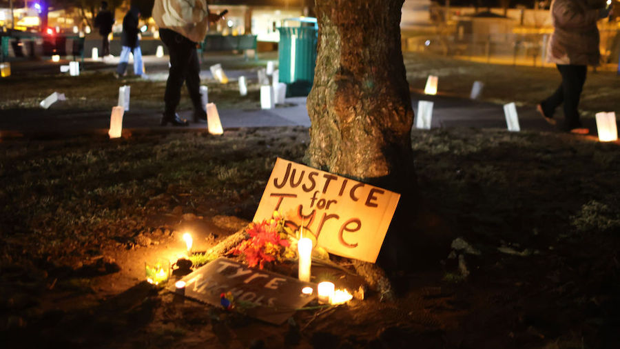 People attend a candlelight vigil in memory of Tyre Nichols at the Tobey Skate Park on January 26, ...