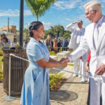 Paola Lespín, a local Latter-day Saint, joyfully greets Elder D. Todd Christofferson at the dedication of the San Juan Puerto Rico Temple on Jan. 15, 2023. (Intellectual Reserve, Inc.)