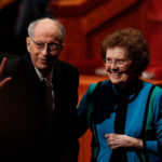 Elder Robert D. Hales leaves with his wife, Mary, from the Sunday afternoon session of general conference in April 2015. (The Church of Jesus Christ of Latter-day Saints)
