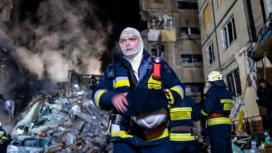 DNIPRO, UKRAINE - JANUARY 15: Emergency workers search the remains of a residential building that w...