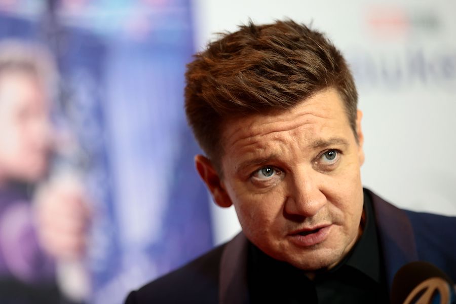 Actor Jeremy Renner was trying to stop his snow-removal tractor from sliding and hitting his grown ...