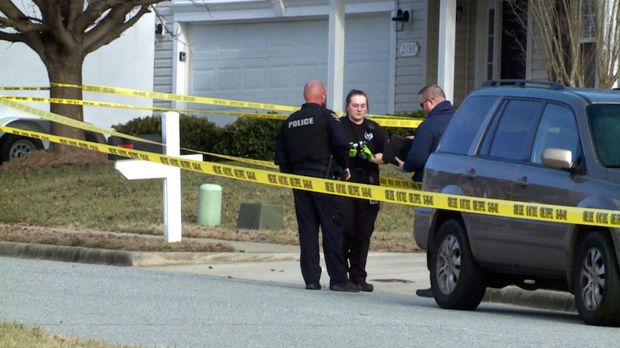 Police work the scene of a murder/suicide in High Point, North Carolina. (WXII)...
