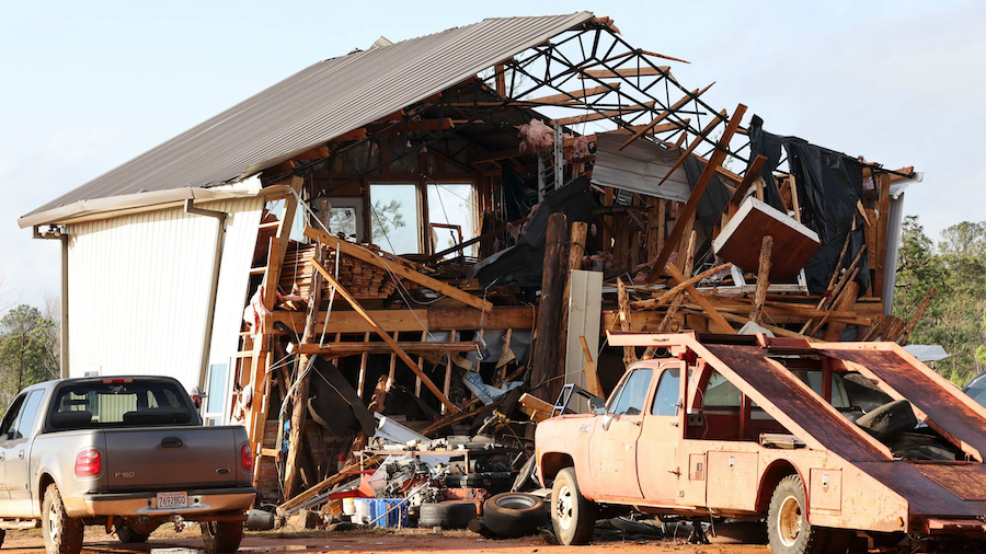 A damaged home is seen in the aftermath of severe weather Thursday near Prattville, Alabama. (Vasha...
