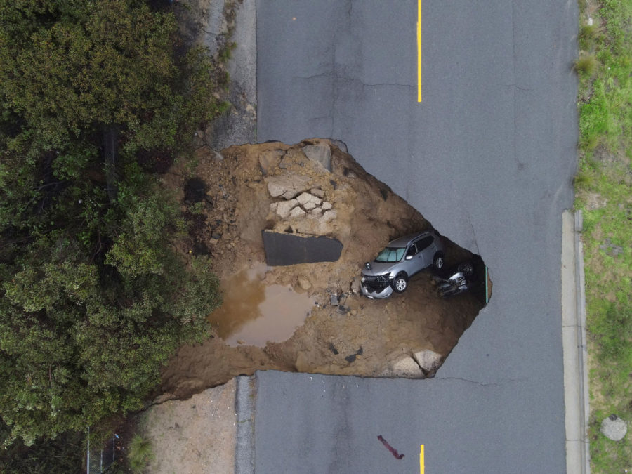 Several people had to be rescued after two vehichles fell into a sinkhole in Chatsworth, California...