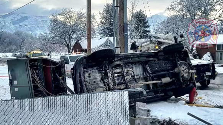 A Toyota truck rolled over on slick roads, hitting several landmarks in it's path. (Weber Fire Dist...