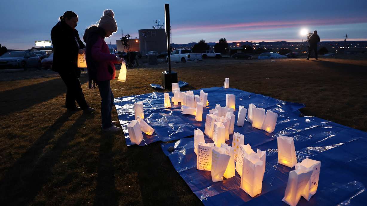 Residents of the town of Enoch come together in honor of Gail Earl and the Haight Family at a vigil...