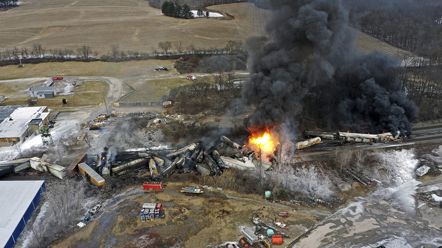 This photo taken with a drone shows portions of a Norfolk and Southern freight train that derailed ...