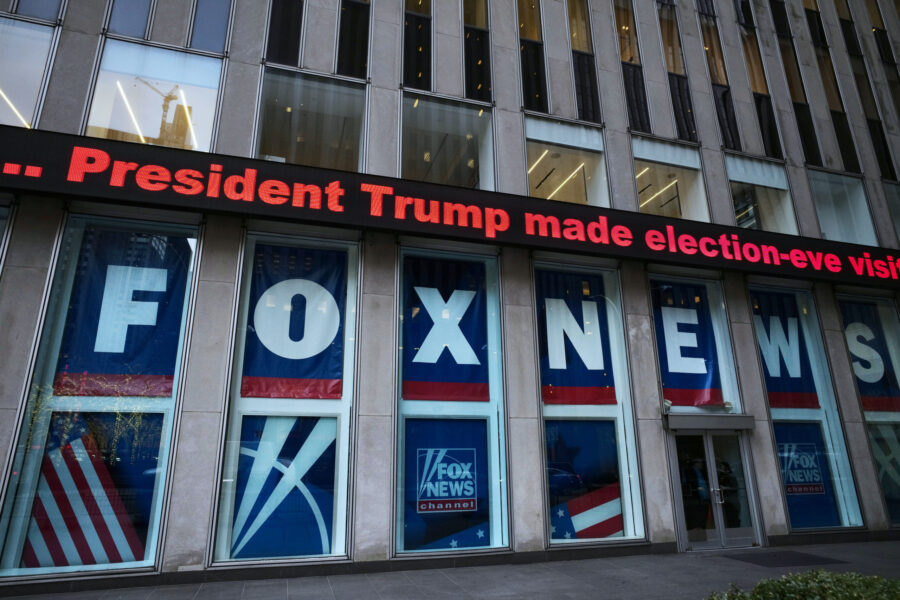 FILE - A headline about President Donald Trump is displayed outside Fox News studios, on Nov. 28, 2...