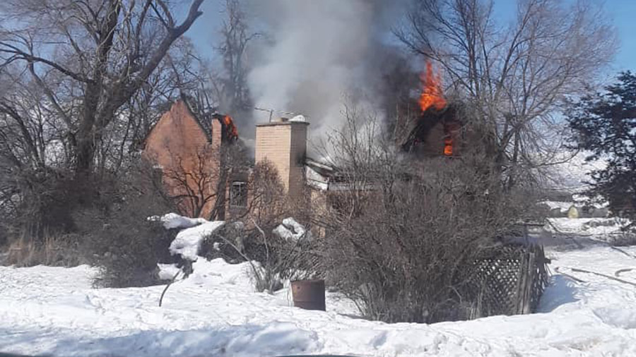 An abandoned farmhouse on fire on Highway 66 Friday morning (Mountain Green Fire District)...
