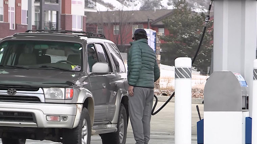 Utahns filling up their cars with gas. (KSL-TV)...