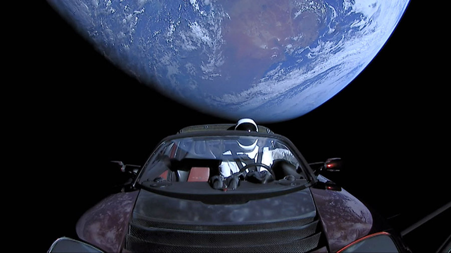 IN SPACE - FEBRUARY 8: In this handout photo provided by SpaceX, a Tesla roadster launched from the...