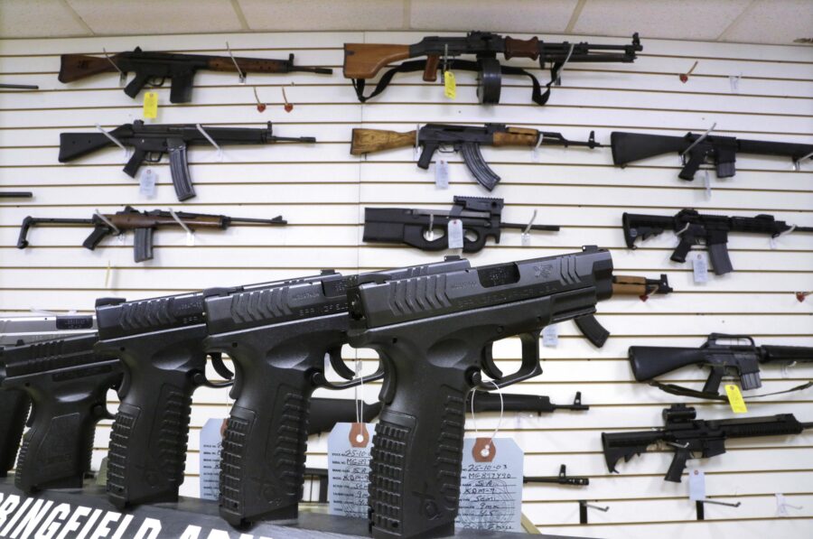 FILE - Assault weapons and hand guns are seen for sale at Capitol City Arms Supply on Jan. 16, 2013...