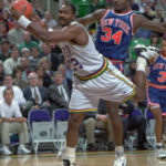 Karl Malone pulls in pass and turns to the basket. Charles Oakley of Knicks in background. (Ravell Call/Deseret News)