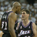 Karl Malone and John Stockton talk in the final minute as the Jazz lost the first game of the playoffs to the Kings, 89-86 in Sacramento, Calif. April 20, 2002. (Tom Smart/Deseret News)