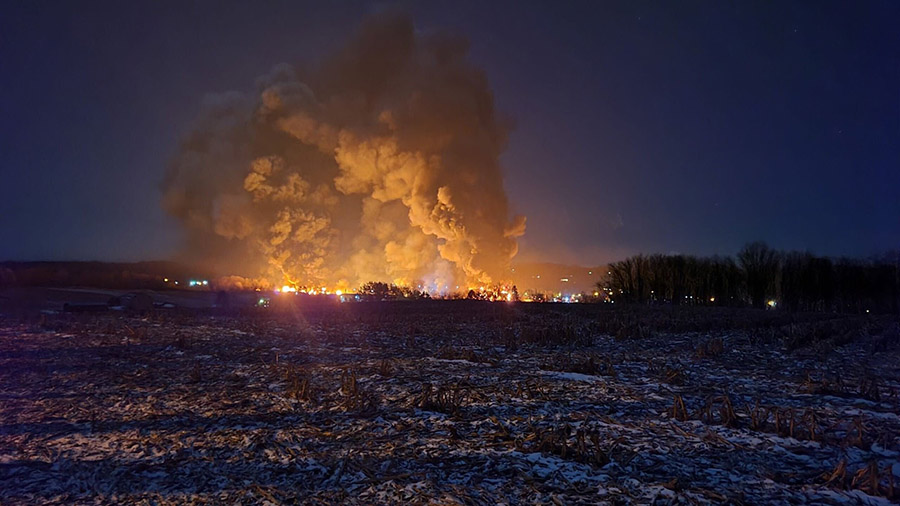 Flames erupt after a train derailment in East Palestine, Ohio, on February 3. (Courtesy Kevin Csern...