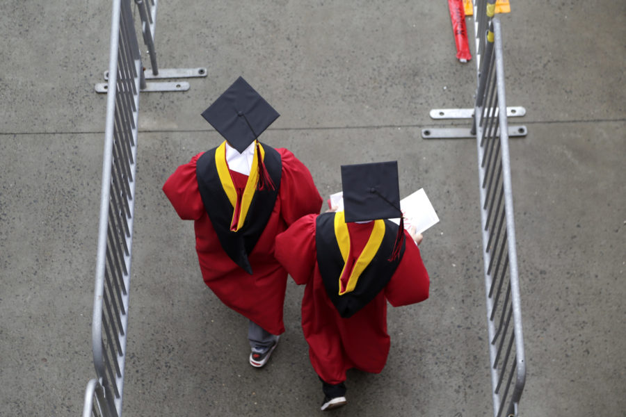 FILE - New graduates walk into the High Point Solutions Stadium before the start of the Rutgers Uni...