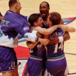 Utah's Karl Malone, center, hugs teammates Jeff Hornacek (14) and John Stockton as Greg Foster, left, joins in the celebration after the Jazz beat the Rockets 103-100 in Game 6 of the Western Conference Finals Thursday, May 29, 1997, in Houston. Stockton hit a 3-pointer at the buzzer for the Jazz victory. The Utah Jazz went on play the Chicago Bulls in The NBA Finals. (Associated Press)