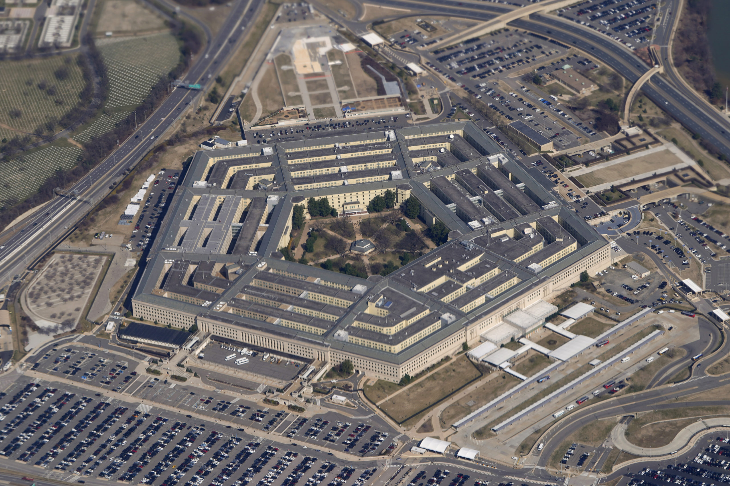 FILE - The Pentagon is seen from Air Force One as it flies over Washington, March 2, 2022. U.S offi...