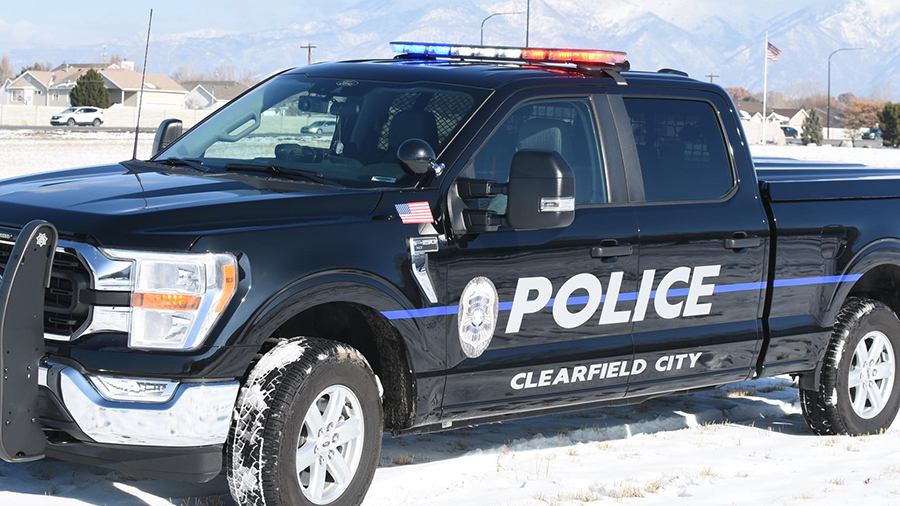 A Clearfield City police truck is in the snow...