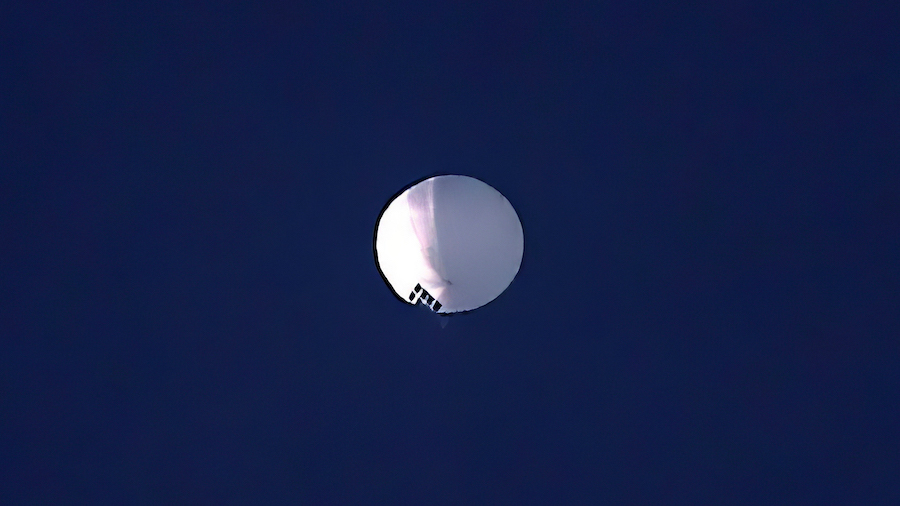 A suspected Chinese high altitude balloon floats over Billings, Montana, on February 1. (Larry Maye...