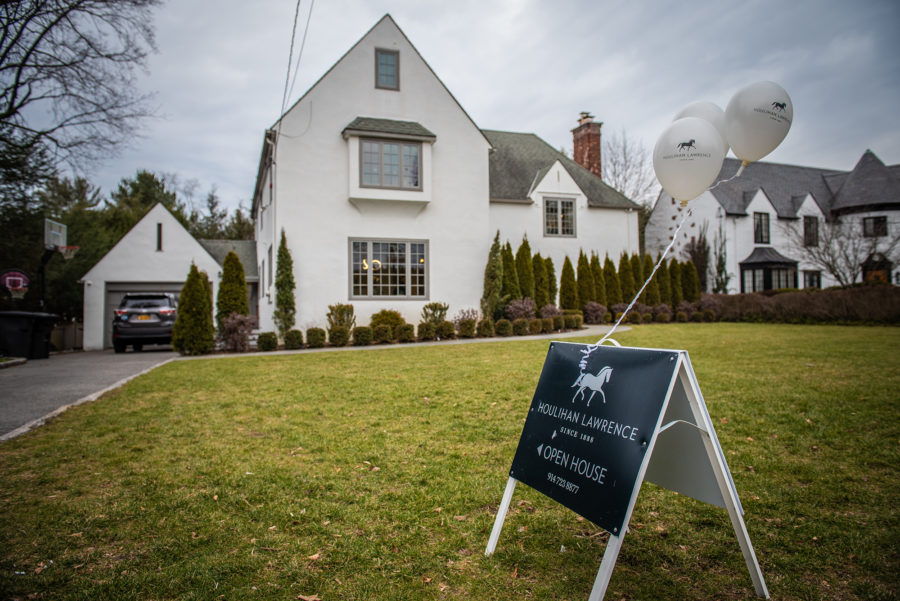 An "Open House" sign outside a home for sale in Scarsdale, New York, US, on Sunday, Jan. 22, 2023. ...