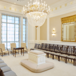 The sealing room in the Richmond Virginia Temple is where families are united for eternity through marriage. The room features an altar in the middle with a crystalline chandelier above it. The mirrors, positioned across from each other, reflect endless images to represent eternity. (Intellectual Reserve, Inc.)