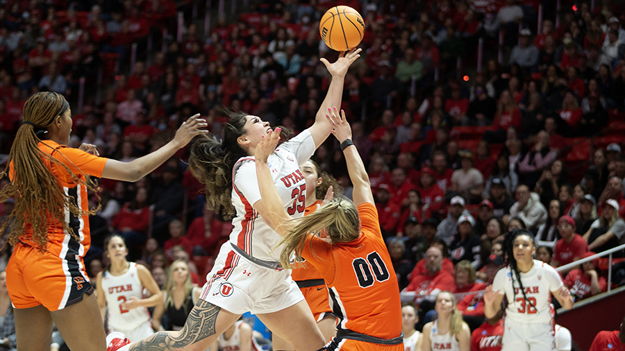 Alissa Pili #35 of the Utah Utes shoots over Ellie Mitchell #00 of the Princeton Tigers during the ...