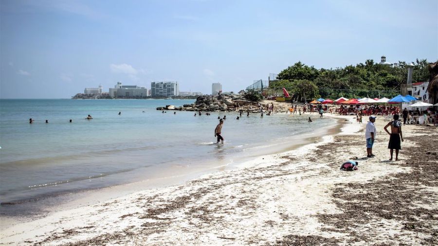 Tourists enjoy 'Playa Tortuga' one day after the passage of Hurricane Delta on October 8, 2020 in C...