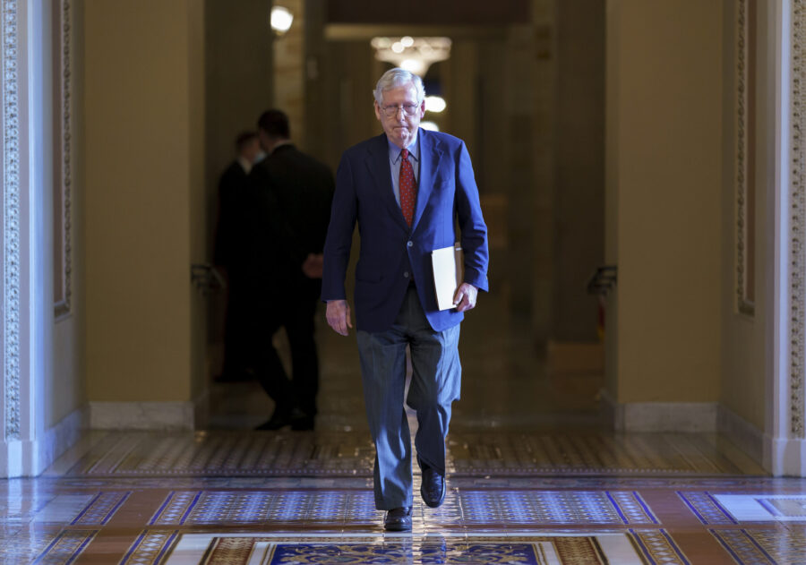 FILE - Senate Minority Leader Mitch McConnell, R-Ky., walks to the chamber for a test vote on a gov...