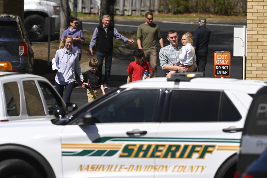 Families leave a reunification site in Nashville, Tenn., Monday, March 27, 2023 after several child...