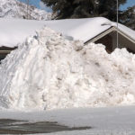 Snow piles from the road. (KSLTV/Stuart Johnson)