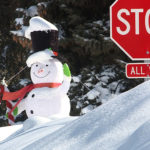 A snowman and a stop sign. (KSLTV/Stuart Johnson)
