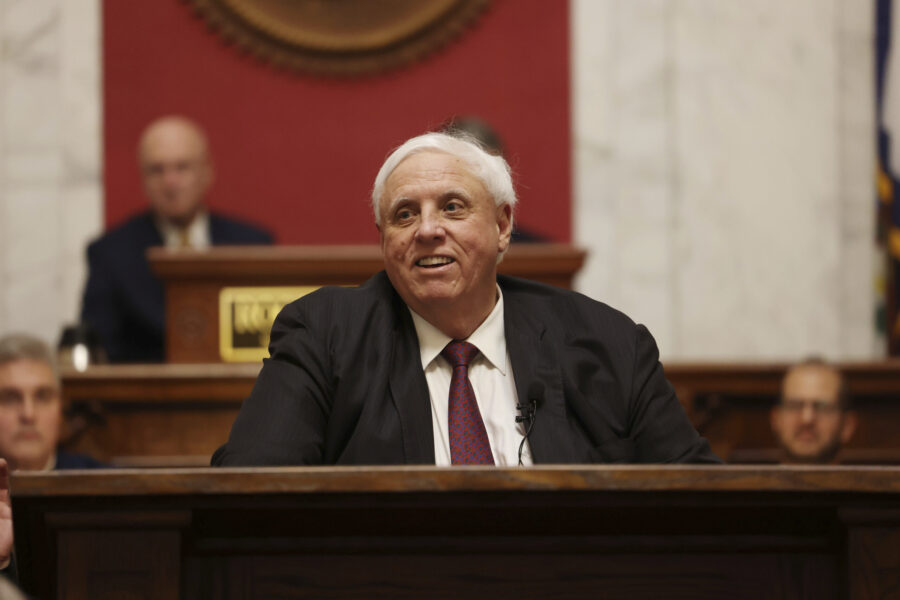 FILE - West Virginia Gov. Jim Justice delivers his annual State of the State address in the House C...