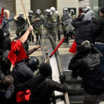 There were violent clashes at the protests in Athens on Sunday
Mandatory Credit:	Louisa Gouliamaki/AFP/Getty Images