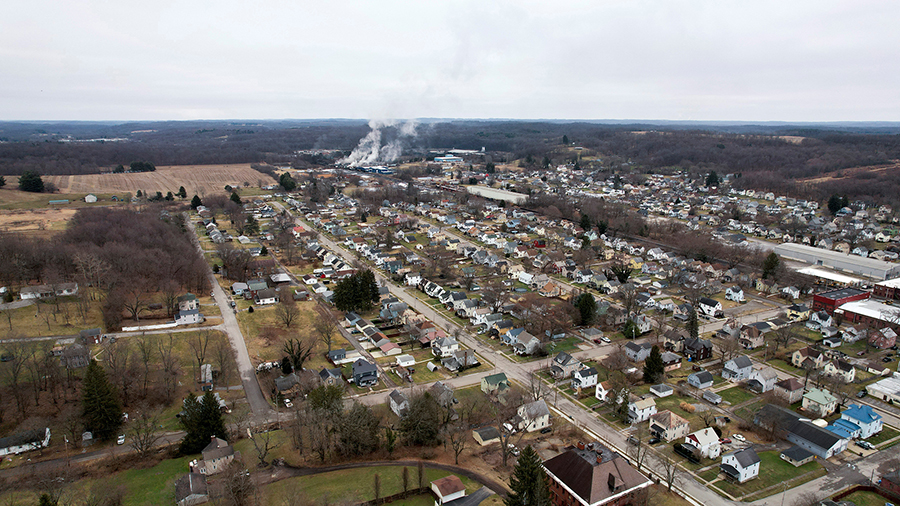 An aerial view shows a plume of smoke, following a train derailment that forced people to evacuate ...