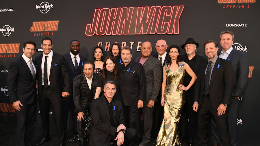 The cast of 'John Wick: Chapter 4' wore blue ribbons to honor late actor Lance Reddick. (Jon Kopalo...