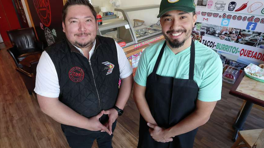 Brothers Christian and Jessie Rosas pose at Don Rafas tacos in Millcreek on Thursday. Their father,...