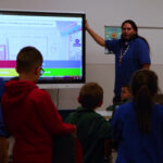 Manuel teaches students in an afterschool program. (KSL TV)