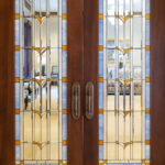 Some of the doors, made of Sapele African Mahogany, in the Saratoga Springs Utah Temple feature art glass and hardware designs of wetland grass and water representing nearby Utah Lake. (Intellectual Reserve, Inc.)