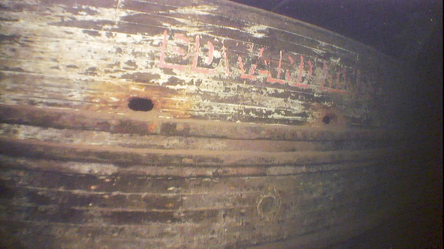 In this image taken from video provided by the Great Lakes Shipwreck Historical Society, lettering ...