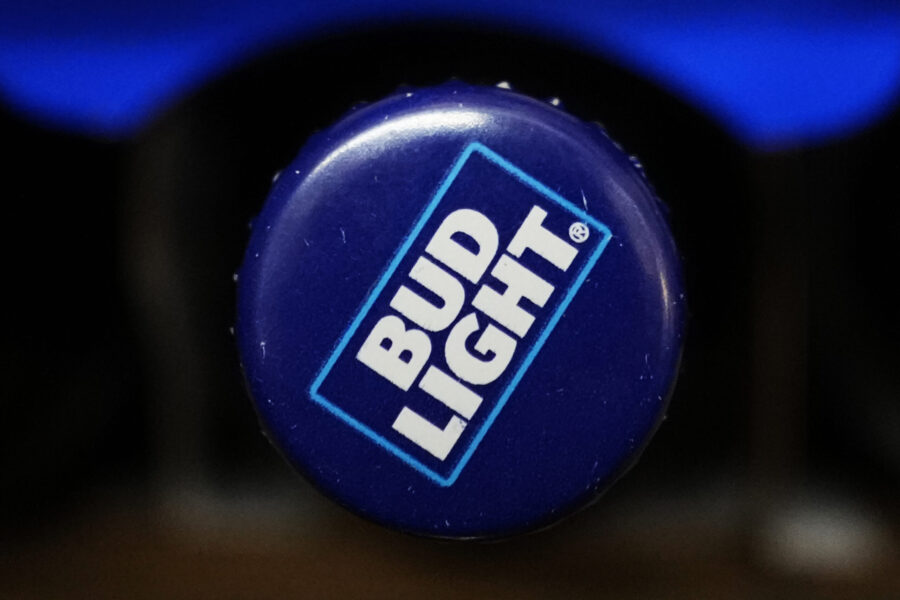 A bottle of Bud Light beer is seen at a grocery store in Glenview, Ill., Tuesday, April 25, 2023. B...