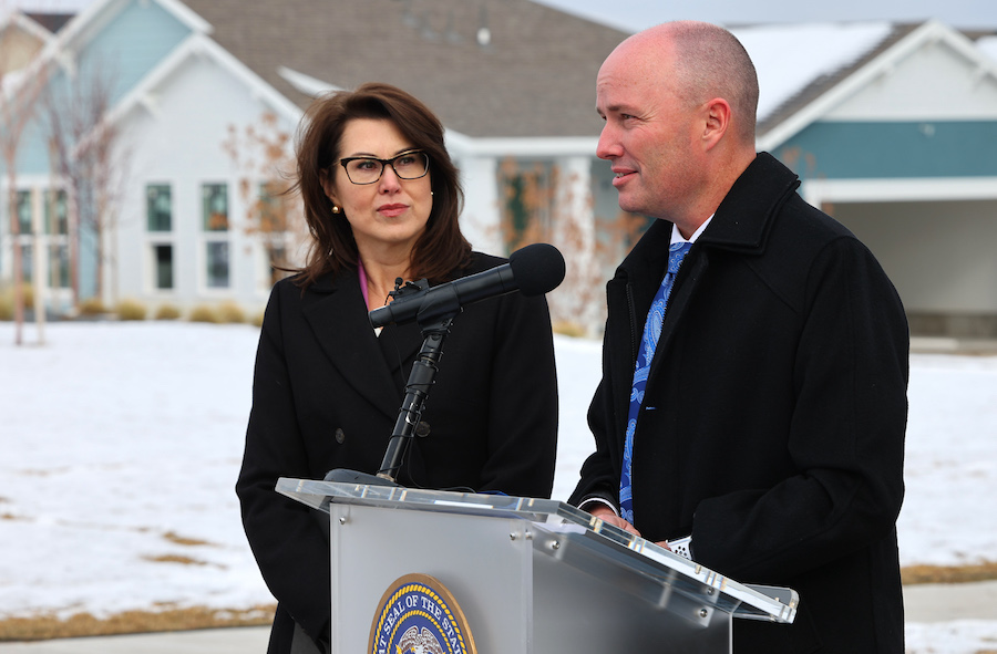FILE — Lt. Gov. Deidre Henderson listens to Gov. Spencer Cox as they release their proposed FY24...