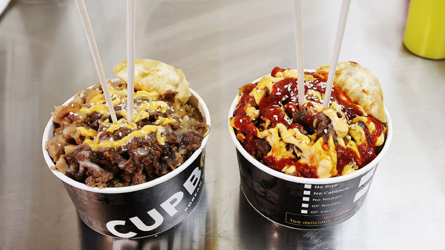 Cupbop bowls are prepared in Salt Lake City on Friday, Feb. 3, 2023. Cupbop is a Korean barbecue in...