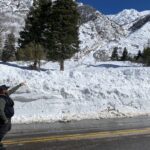 That's Jake Brown, supervisor of the UDOT road crews up in Llittle Cottonwood Canyon trying to get it open. He's pointing at the massive slide at Lisa Falls that deposited a huge amount of avalanche debris on the road.