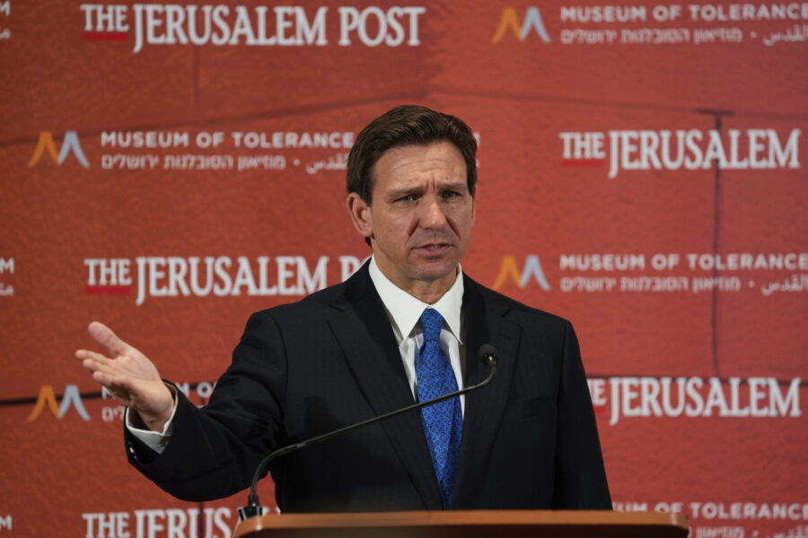 Florida Gov. Ron DeSantis talks to the media at a conference titled "Celebrate the Faces of Israel"...