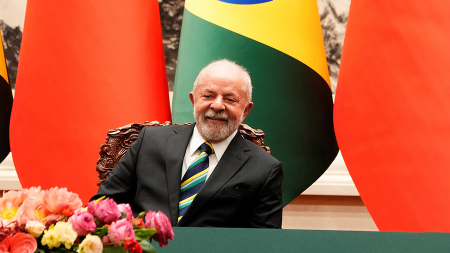 Chinese President Xi Jinping (not pictured) attends a signing ceremony with Brazilian President Lui...