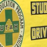 A poster of the Utah Driver Education Program is showcased in driver’s ed teacher Chad Lythgoe’s classroom. (KSL TV)