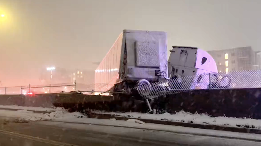 A semitruck jackknifed near the 12300 South exit of I-15 in Draper Monday morning as snow moved in ...
